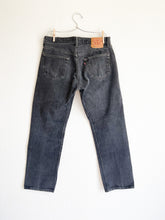 Load image into Gallery viewer, Vintage Levi&#39;s 501 Faded Black Wash 33&quot; Waist

