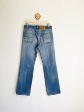 Load image into Gallery viewer, Vintage Levi&#39;s 517 Orange Tab Jeans with Distressed Knees - 33&quot; Waist
